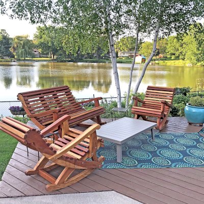 Ensenada Wooden Rocking Chair (Options: Standard Width, California Redwood, No Cushion,Transparent Premium Sealant). Photo Also Shows an Ensenada Rocking Bench. Photo Courtesy of D. Womack of White Bear Lake, Minnesota.
