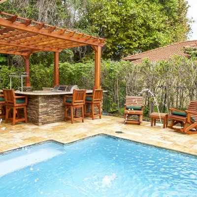 Ensenada Wooden Rocking Chair (Options: Standard Width, Mature Redwood, Forest Green Cushion,Transparent Premium Sealant). Photo Courtesy of Jorge A. of Miami, Florida.  
