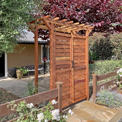 Custom Entryway Arbor with Custom Gate insted of Panels (Options: 78" W, 36" D, California Redwood, Transparent Premium Sealant). Photo Courtesy of C. Albert of Carpinteria, California.