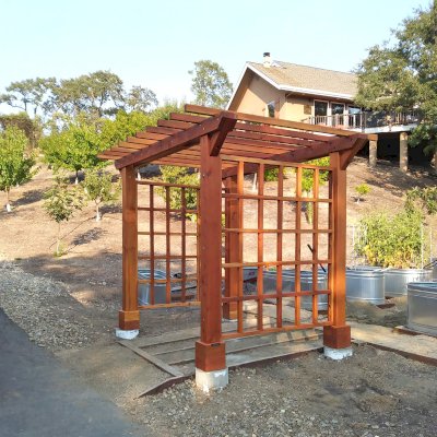 Custom Entryway Arbor (Options: 120" W, 84" D, California Redwood, 4-Post Archor Kit for Concrete, Transparent Premium Sealant) with 6 x 6 Posts and 2 x 6 Rafters by Custom Request. Photo Courtesy of K. Moore of Healdsburg, CA.