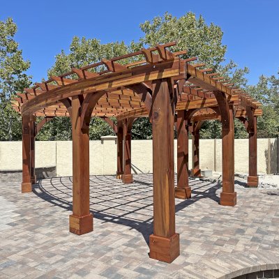 Fan Shaped Pergola Kit (Options: 35' x 16', California Redwood, With Roof Slats, No Electrical Wiring Trim Kit, Post Anchor Kit for High Wind, No Ceiling Fan Base, 10' Posts, No Curtain Rods, Transparent Premium Sealant). Photo Courtesy of R. & M. Gonzalez of Dublin, CA.