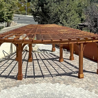 Fan Shaped Pergola Kit (Options: 35' x 16', California Redwood, With Roof Slats, No Electrical Wiring Trim Kit, Post Anchor Kit for High Wind, No Ceiling Fan Base, 10' Posts, No Curtain Rods, Transparent Premium Sealant). Photo Courtesy of R. & M. Gonzalez of Dublin, CA.