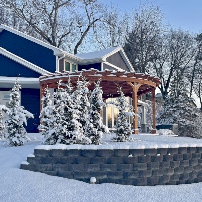 Custom Fan Shaped Pergola Kit (Options: 25' x 18', Mosaic Redwood, With Roof Slats, No Electrical Wiring Trim Kit, Post Anchor Kit for High Wind, No Ceiling Fan Base, 9.5' Posts, No Curtain Rods, Transparent Premium Sealant). Photo Courtesy of T. Gabrielson of Ventura, IA.