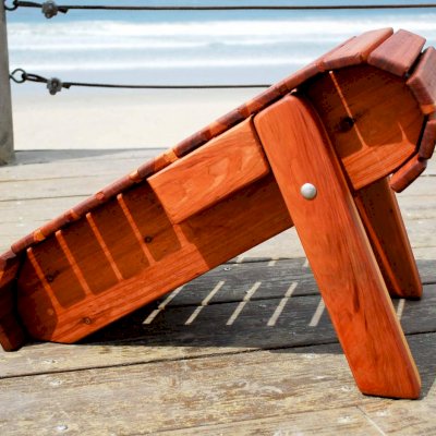 Closes up Compactly: Folding Adirondack Ottoman (Options: California Redwood, Transparent Premium Sealant).