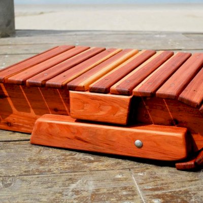 Closes up Compactly: Folding Adirondack Ottoman (Options: California Redwood, Transparent Premium Sealant).