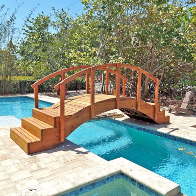 Custom Forever Foot Bridge (Options: 12' L, California Redwood, 5' Wide Instead of the Standard 4' Width, with Custom Steps, Transparent Premium Sealant). Photo Courtesy of A. Roe of Boca Grande, Florida.