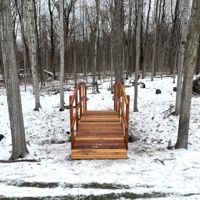 Custom Forever Foot Bridge (Options: 18' L, California Redwood, 4' Width, Transparent Premium Sealant). Photo Courtesy of T. Reyes of St. Charles, IL.