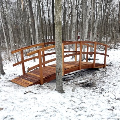 Custom Forever Foot Bridge (Options: 18' L, California Redwood, 4' Width, Transparent Premium Sealant). Photo Courtesy of T. Reyes of St. Charles, IL.