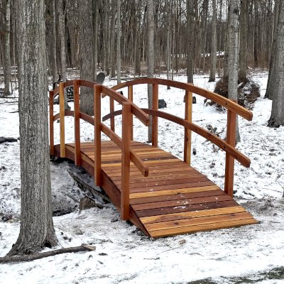 Custom Forever Foot Bridge (Options: 18' L, California Redwood, 4' Width, Transparent Premium Sealant). Photo Courtesy of T. Reyes of St. Charles, IL.