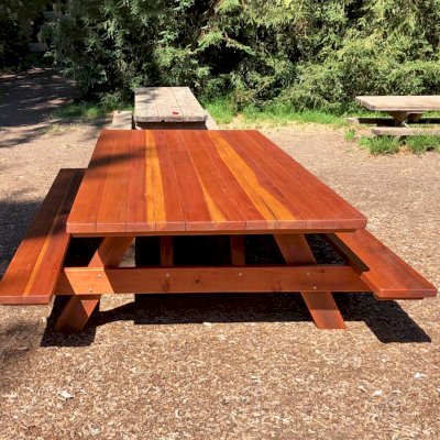 Forever Picnic Table (Attached Benches) (Options: 10' L x 60" W, California Redwood, Standard Tabletop, No Umbrella Hole, Slightly Rounded Corners, With One Bench Trimmed, Transparent Premium Sealant). Photo Courtesy of G. Toy of fairfax, California.
