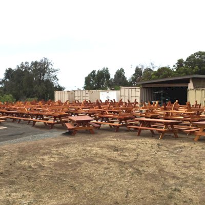 Photo Courtesy of El Capitan State Beach in Goleta, CA. Shows over 30 8' table sets as part of 130 table installation in progress in July 2015.