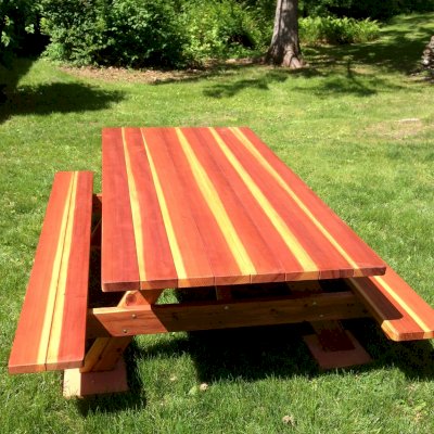 Forever Picnic Tables (Attached Benches) (Options: 8' L, 46" W, Side Benches, California Redwood, Standard Tabletop, Slightly Rounded Corners, No Umbrella Hole, Transparent Premium Sealant). Photo Courtesy of Dr. Joe De Simone of Slate Hill, NY.