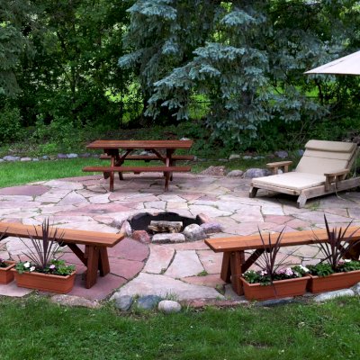 Forever Picnic Tables (Attached Benches) (Options: 6' L, 34 1/2" W, Side Benches, Old-Growth Redwood, Standard Tabletop, Rounded Corners, Umbrella Hole, Transparent Premium Sealant). Photo Courtesy of M. Wolf of Golden Valley, Minnesota.