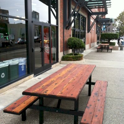 Photo shows custom "Beer Hall" steel framed table manufactured for the Zynga Corporation headquarters in San Francisco, CA. Yes, if you have a custom design in mind, let us know. We can do it for you! Note: Client requested battered and extreme rustic finish to table...