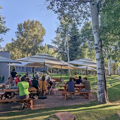 Forever Picnic Tables (Unattached Benches) (Options: 6' L, 34 ½in W, Side Benches, Douglas-fir, 1 Full Length Side Benches Per Side, Standard Tabletop, Slightly Rounded Corners, No Umbrella Hole, Transparent Premium Sealant). Photo Taken at the Aspen Center for Physics.