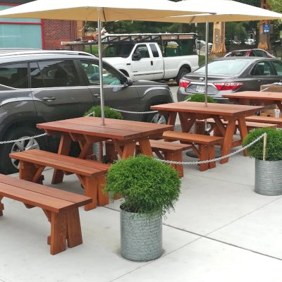 Custom Forever Picnic Tables (Unattached Benches) (Options: 5' L, 34 ½in W, Old-Growth Redwood, 1 Full Length Bench Per Side, Standard Tabletop, Slightly Rounded Corners, Umbrella Hole, Table with an Extra Brace Underneath to Hold the Umbrella Stand, Transparent Premium). Photo Courtesy of A. Peterson of Chicago, Illinois.