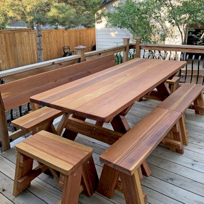 Forever Picnic Tables (Unattached Benches)  (Options: 7' L, 34 ½in W, Side and End Benches, California Redwood, 1 Full Length Fullback Bench on One Side, and 2 Half Length Picnic Benches on the Other Side, Standard Tabletop, Squared Corners, 2in Diameter Umbrella Hole, Transparent Premium Sealant). Photo Courtesy of I. Miller of Longmont, Colorado.
