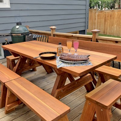 Forever Picnic Table (Unattached Benches) (Options: 7' L, 34 ½in W, Side and End Benches, California Redwood, 1 Full Length Fullback Bench on One Side, and 2 Half Length Picnic Benches on the Other Side, Standard Tabletop, Squared Corners, 2in Diameter Umbrella Hole, Transparent Premium Sealant). Photo Courtesy of I. Miller of Longmont, Colorado.