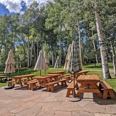 Forever Picnic Tables (Unattached Benches) (Options: 6' L, 34 ½in W, Side Benches, Douglas-fir, 1 Full Length Side Benches Per Side, Standard Tabletop, Slightly Rounded Corners, No Umbrella Hole, Transparent Premium Sealant). Photo Taken at the Aspen Center for Physics.