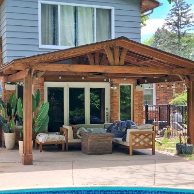 Forever Porch Pavilion (Options: 18' L x 12' W, Douglas-fir, 2-Post Anchor Kit for High-Wind, No Electrical Wiring Trim, 8.5 ft Posts Height, Vertical Post Decorative Trims, No Ceiling Fan Base, No Curtain Rods, No Privacy Panels, Transparent Premium Sealant). Photo Courtesy of C. Mellanby of West Bloomfield, Michigan.