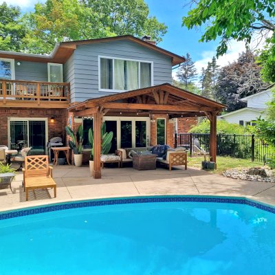 Forever Porch Pavilion (Options: 18' L x 12' W, Douglas-fir, 2-Post Anchor Kit for High-Wind, No Electrical Wiring Trim, 8.5 ft Posts Height, Vertical Post Decorative Trims, No Ceiling Fan Base, No Curtain Rods, No Privacy Panels, Transparent Premium Sealant). Photo Courtesy of C. Mellanby of West Bloomfield, Michigan.