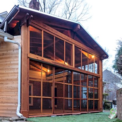 Forever Porch Pavilion (Options: 20' L x 20'-9" W, California Redwood, 2-Post Anchor Kit for High-Wind, No Electrical Wiring Trim, with 2 Fascia Boards for Gutters, 12 ft Posts Height, No Post Decorative Trims, 1 Ceiling Fan Base, No Curtain Rods, with Privacy Panels, Screened Sliding Doors and Fixed Screen Panels, Transparent Premium Sealant). Photo Courtesy of J. Pegg of Cordova, TN.
