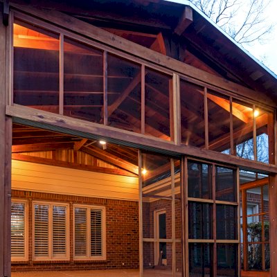 Forever Porch Pavilion (Options: 20' L x 20'-9" W, California Redwood, 2-Post Anchor Kit for High-Wind, No Electrical Wiring Trim, with 2 Fascia Boards for Gutters, 12 ft Posts Height, No Post Decorative Trims, 1 Ceiling Fan Base, No Curtain Rods, with Privacy Panels, Screened Sliding Doors and Fixed Screen Panels, Transparent Premium Sealant). Photo Courtesy of J. Pegg of Cordova, TN.