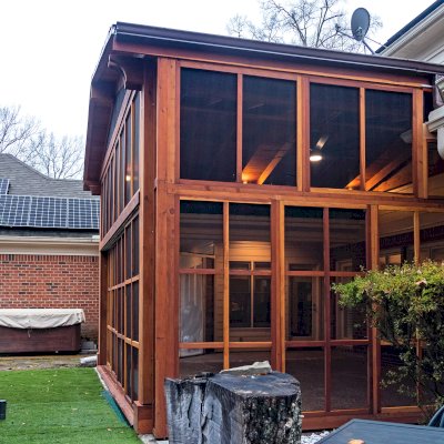 Forever Porch Pavilion (Options: 20' L x 20'-9" W, California Redwood, 2-Post Anchor Kit for High-Wind, No Electrical Wiring Trim, with 2 Fascia Boards for Gutters, 12 ft Posts Height, No Post Decorative Trims, 1 Ceiling Fan Base, No Curtain Rods, with Privacy Panels, Screened Sliding Doors and Fixed Screen Panels, Transparent Premium Sealant). Photo Courtesy of J. Pegg of Cordova, TN.