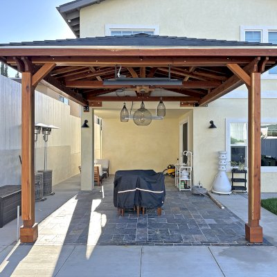Custom Forever Porch Pavilion (Options: Hip Roof by Custom Request, 15' L x 15' W, California Redwood, 2-Post Anchor Kit for High-Wind, with 2 Electrical Wiring Trims, 10.5ft Posts Height, 1 Ceiling Fan Base, No Curtain Rods, No Privacy Panels, Transparent Premium Sealant). Photo Courtesy of W. Zhang of Thousand Oaks, CA.