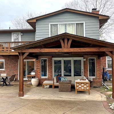 Forever Porch Pavilion (Options: 18' L x 12' W, Douglas-fir, 2-Post Anchor Kit for High-Wind, No Electrical Wiring Trim, 8.5 ft Posts Height, Vertical Post Decorative Trims, No Ceiling Fan Base, No Curtain Rods, No Privacy Panels, Transparent Premium Sealant). Photo Taken 1 Year After Installation. Photo Courtesy of C. Mellanby of West Bloomfield, Michigan.