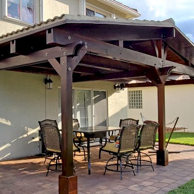 Forever Porch Pavilion (Options: 12' L x 25' W, California Redwood, 3-Post Anchor Kit for High-Wind, No Electrical Wiring Trim, 9ft Posts Height, No Ceiling Fan Base, No Curtain Rods, No Privacy Panels, Transparent Premium Sealant). Photo Courtesy of Carol Varela of Florida.