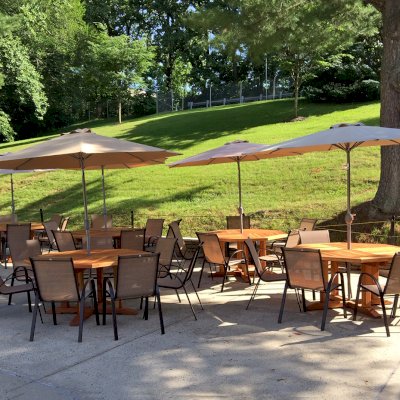 Helen's Octagonal Terrace Tables (Options: 5 ft, No Seating, California Redwood, Standard Tabletop, Rounded Corners, Umbrella Hole, Transparent Premium Sealant). Photo Courtesy of D. Flanigan of Silver Spring, Maryland.