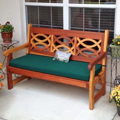 Hennell Wooden Garden Bench (Options: 5 ft, California Redwood, Forest Green Cushion, Custom Engraving, Transparent Premium Sealant). Photo Courtesy of Elizabeth Davies of The Villages, Florida. 