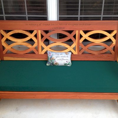 Hennell Wooden Garden Bench (Options: 5 ft, California Redwood, Forest Green Cushion, Custom Engraving, Transparent Premium Sealant). Photo Courtesy of Elizabeth Davies of The Villages, Florida. 