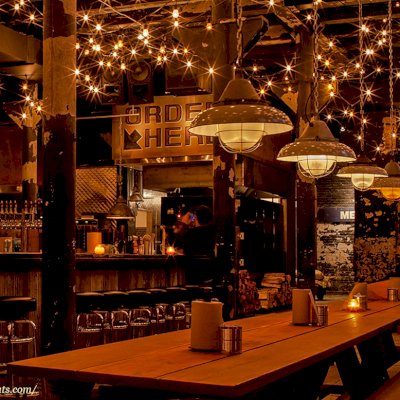 Heritage Large Wooden Picnic Table at ''Green Street Smoked Meats'' Restaurant, 112 N Green St, Chicago, IL 60607 (Options: Several Sizes, 34 1/2'' W, Unattached Side Benches, Transparent Premium Sealant). Photo Courtesy of Jennifer Whang of Chicago, Illinois.