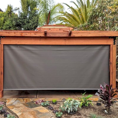 Hot Tub Enclosure Kits / Hot Tub Pavilion (Options: 12' x 16', Mature Redwood, Without Skylight, Custom Louvered Privacy Walls for the Top Half and Solid Wood Walls for the Bottom Half on 2 Sides, Transparent Premium Sealant). Photo Courtesy of J. Earney of San Diego, CA. Screen From North Solar Screen: https://northsolarscreen.com/outdoor-shades/blackout-total-privacy-shades/grande-blackout-heavy-duty/ 