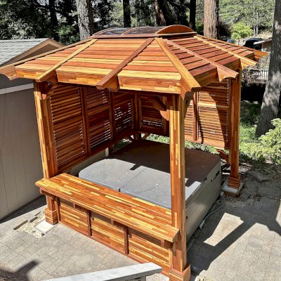 Hot Tub Enclosure Kits / Hot Tub Pavilion (Options: 9' x 9', Mosaic Redwood, With 4' x 4' Skylight, Louvered Panels on 2 Sides and Bar by Custom Request, 30" H Windows Clearance, 9.5' H Posts, No Curtain Rod, 4-Post Anchor Kit for Concrete, Transparent Premium Sealant). Photo Courtesy of M. Van Zanen of Ben Lomond, CA.