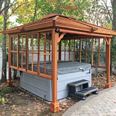 Hot Tub Enclosure Kits / Hot Tub Pavilion (Options: 10' x 10', California Redwood, 3' x 3' Skylight, Sliding Windows on 3 Sides [Clear Polycarbonate Windows by Custom Request], 30" H Windows Clearance, 1 Curtain Rod, 4-Post Kit for High-Wind, Transparent Premium Sealant). Photo Courtesy of T. Bohnert of Newtonville, Massachusetts.