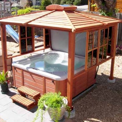 Hot Tub Enclosure Kits / Hot Tub Pavilion (Options: 9' x 9', California Redwood, Windows on 3 Sides, No Curtain Rods, 4-Post Anchor Kit for Stone, Transparent Premium Sealant). Photo Courtesy of John Grubb.
