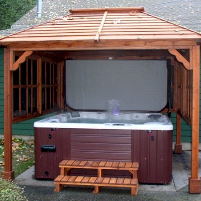 Hot Tub Enclosure Kits / Hot Tub Pavilion (Options: 9' x 9', California Redwood, Windows on 3 Sides, No Curtain Rods, 4-Post Anchor Kit for Stone, Transparent Premium Sealant). Photo Courtesy of John Grubb.