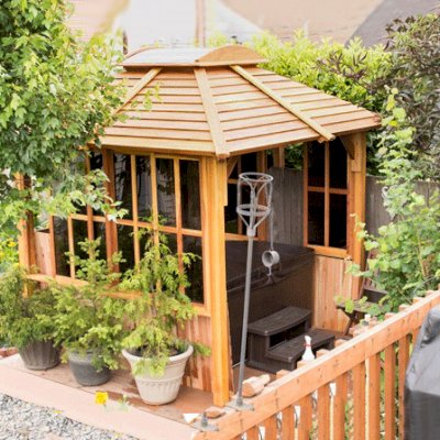 Hot Tub Enclosure Kits / Hot Tub Pavilion (Options: 8' x 8', California Redwood, Windows on 3 Sides, Transparent Premium Sealant). Photo Courtesy of Mark L. of Everett, Washington. Note: Custom wall construction per customer request.