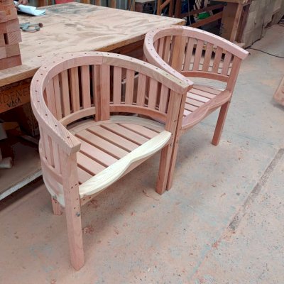 Jane's Key West Benches in California Redwood. Photo taken in production, before stain was added. 