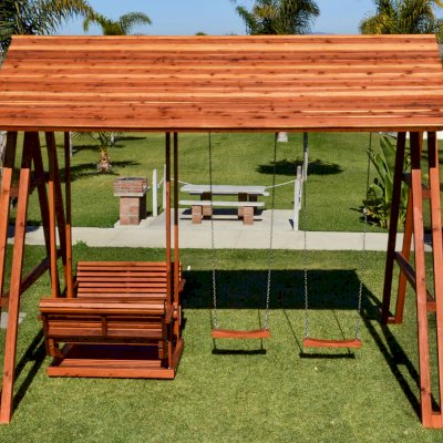 Jean's Ultimate Swing Sets (Options: Mature Redwood, San Anthony Glider with 2 Standard Swing Seats, Standard Roof, No Kid's Platform/Side Table, No, Engraving, Transparent Premium Sealant)