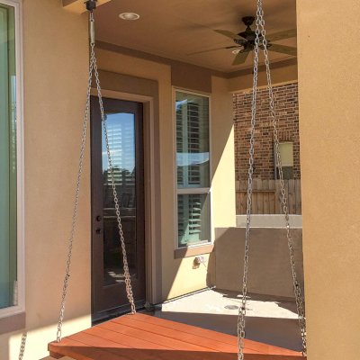 Jhoola Day Bed Swing Sets (Options: 5' L, 30" W, Seat Only, Old-Growth Redwood, All Beam Hanging Hardware, No Railings, No Railings, No Cushion, Transparent Premium Sealant). Photo Courtesy of Anita Singh of Katy, TX.