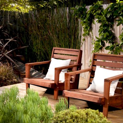 Kari's Modern Wood Chair (Options: Old-Growth Redwood, Original Low Seat Design (8" H seat), No Cushion, Transparent Premium Sealant) Custom throw cushion available upon request. Photo Courtesy of Ms. Kari Hamilton, Cardiff By the Sea, CA.