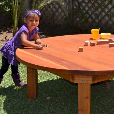 Kid's Round Outdoor Wood Table (Options: 5' Diameter, No Seating, California Redwood, Seamless Tabletop, Transparent Premium Sealant). 