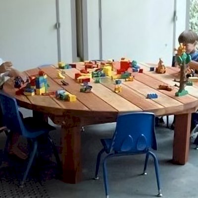 Kid's Round Outdoor Wood Table (Options: 5' Diameter, No Seating, California Redwood, Standard Tabletop, No Umbrella Hole, Transparent Premium Sealant). 