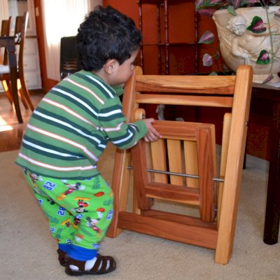 Kid's Wooden Folding Chair (Options: California Redwood, No Cushions, Transparent Premium Sealant). Photo courtesy of Alvarez family of Ensenada, Mexico. 