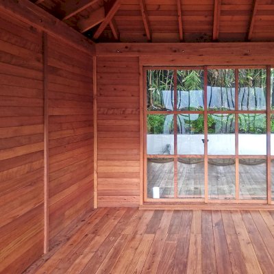 Custom Kikue's Tea House (Options: 12' L x 12' W, 7' Wall Height, Shiplap Roof, Mature Redwood, 1 Wood Handle, with Solid Walls by Custom Request, Interior and External Decking, 3' Deck on the Front Side, Transparent Premium Sealant). Photo Courtesy of A. Michelson of Los Angeles, CA.