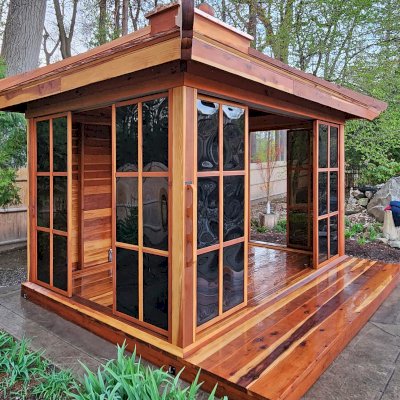 Kikue's Tea House (Options: 14 ft L x 10 ft W, 8' Wall Height, Wood Shingle Roof, California Redwood, 3 Sliding Walls and One Fixed Wood Wall, No Electrical Wiring Trim, with Wood Handle, Interior and External Decking, Transparent Premium Sealant). Photo Courtesy of A. Perry of Longmeadow, MA.